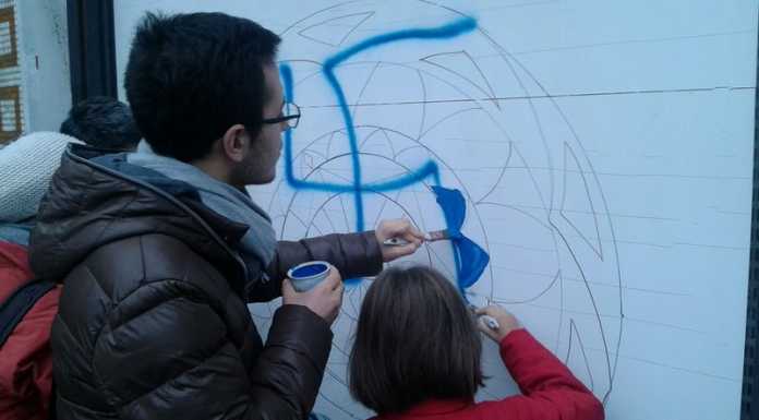 Combattere l’odio con l’arte. A Calolzio un mandala al posto della svastica