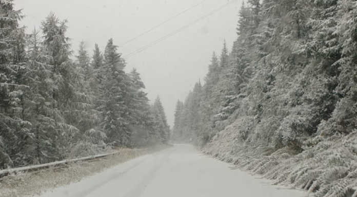 Estate già dimenticata, pioggia in città e neve sulle cime