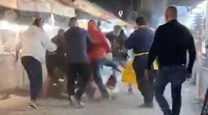 Rissa tra le bancarelle del lungolago, il video