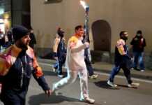 Il passaggio della Fiaccola Olimpica sul lago, fotografie da Varenna e Abbadia